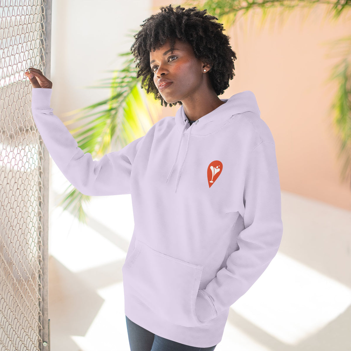 Gravity Skiing Fleece Hoodie in Lilac, female model, front
