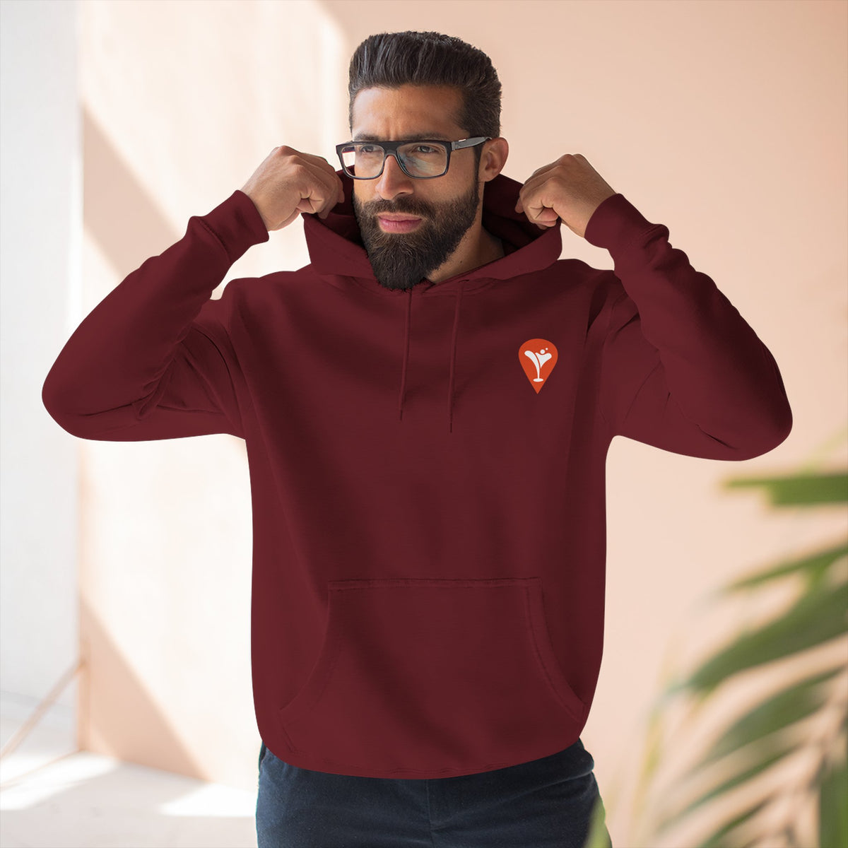 Gravity Skiing Fleece Hoodie in Burgundy, male model, front