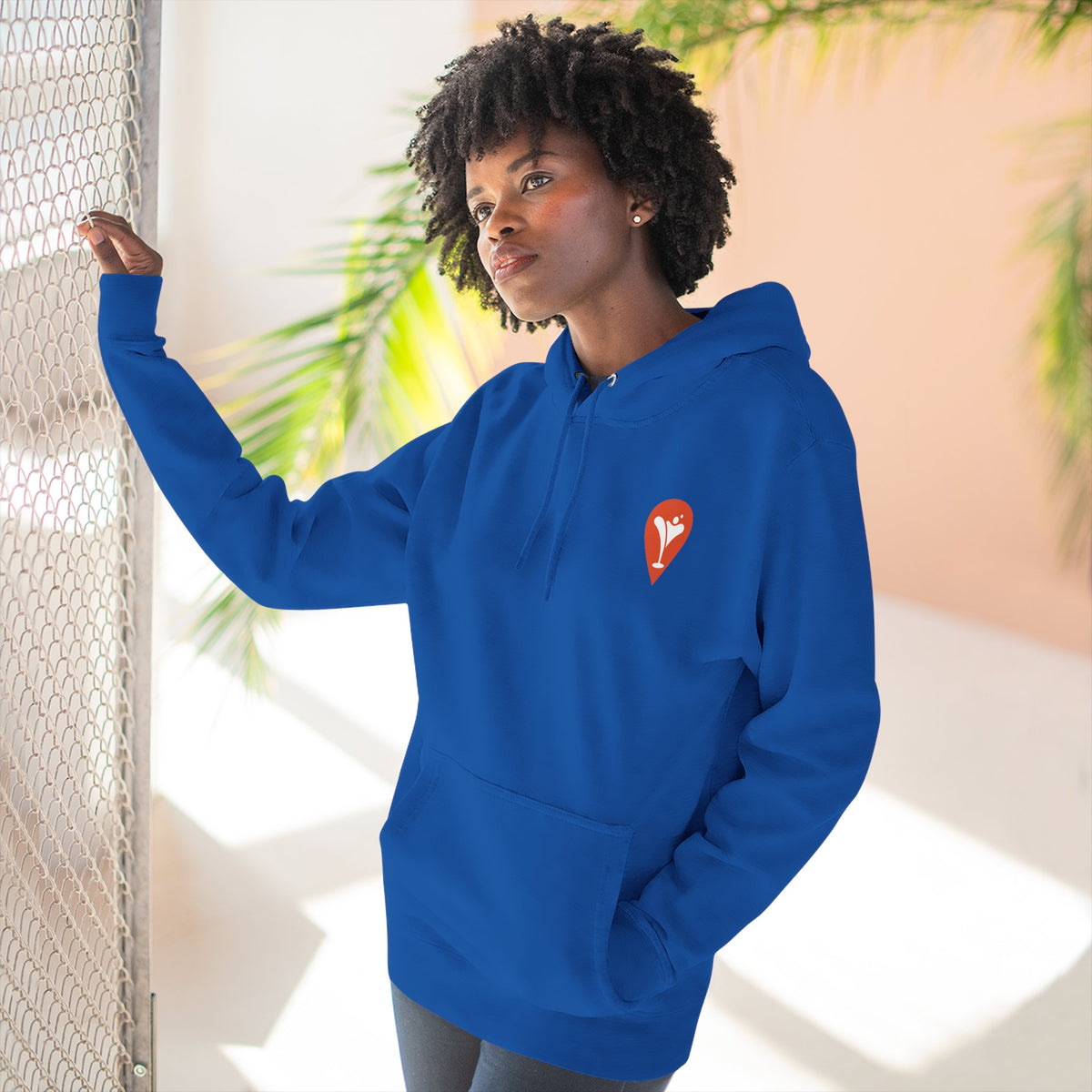 Gravity Skiing Fleece Hoodie in Royal Blue, female model, front