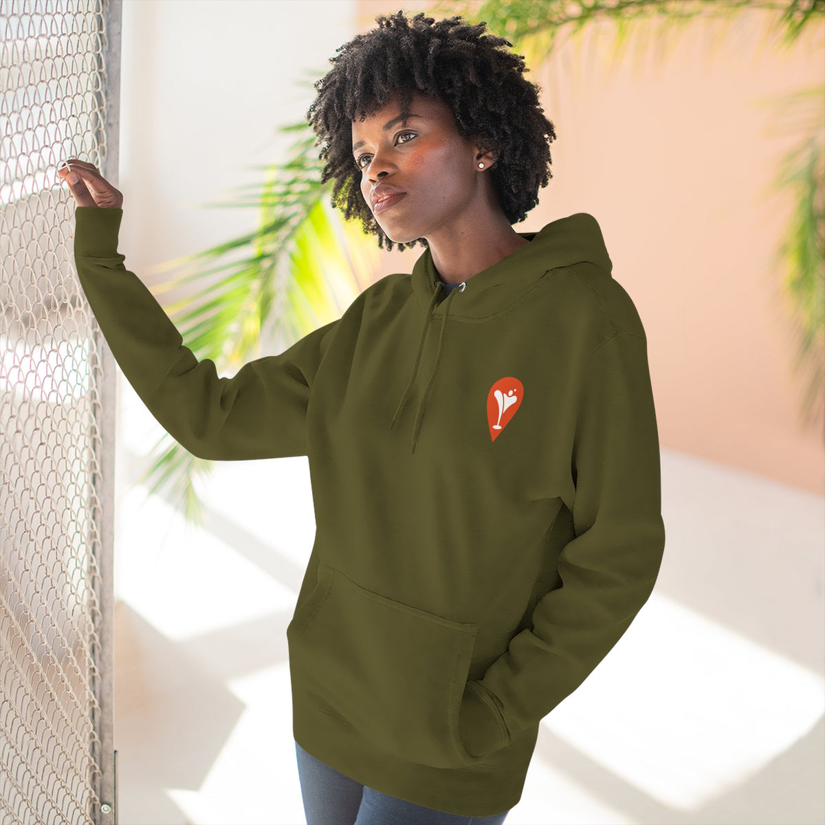 Gravity Skiing Fleece Hoodie in Army Green, female model, front